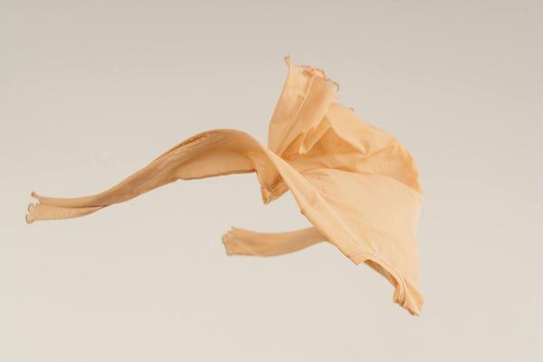 A flowing fabric in the air, symbolizing smooth movement.